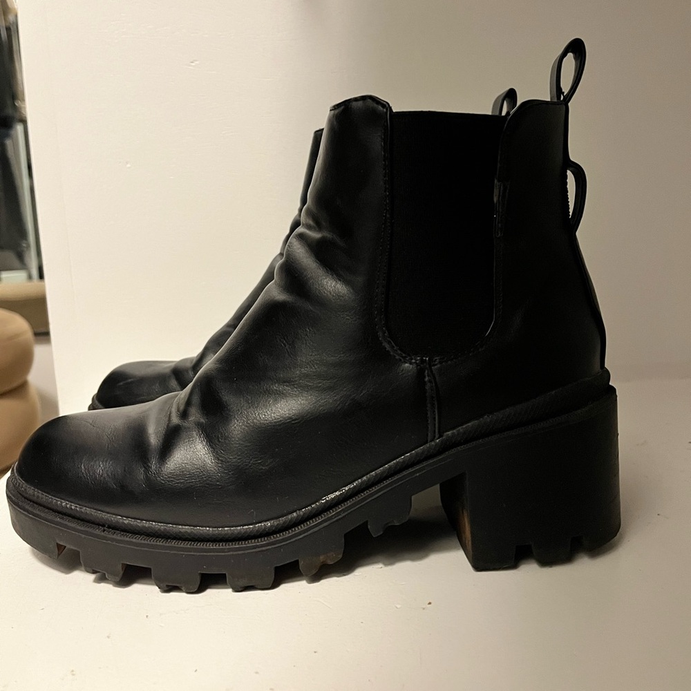 Black platform Chelsea boots by Kate Miller